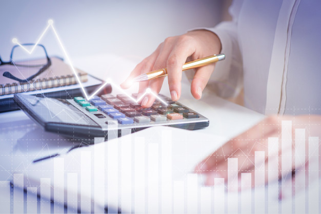 Accountant calculating profit 